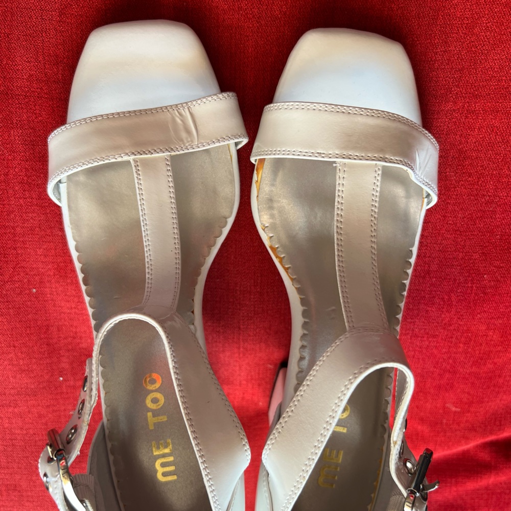 Me too white heeled patent sandals.